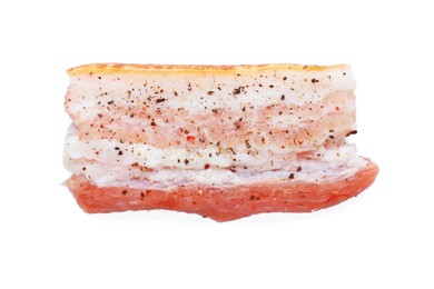 Photo of Slice of tasty pork fatback with spices isolated on white, top view