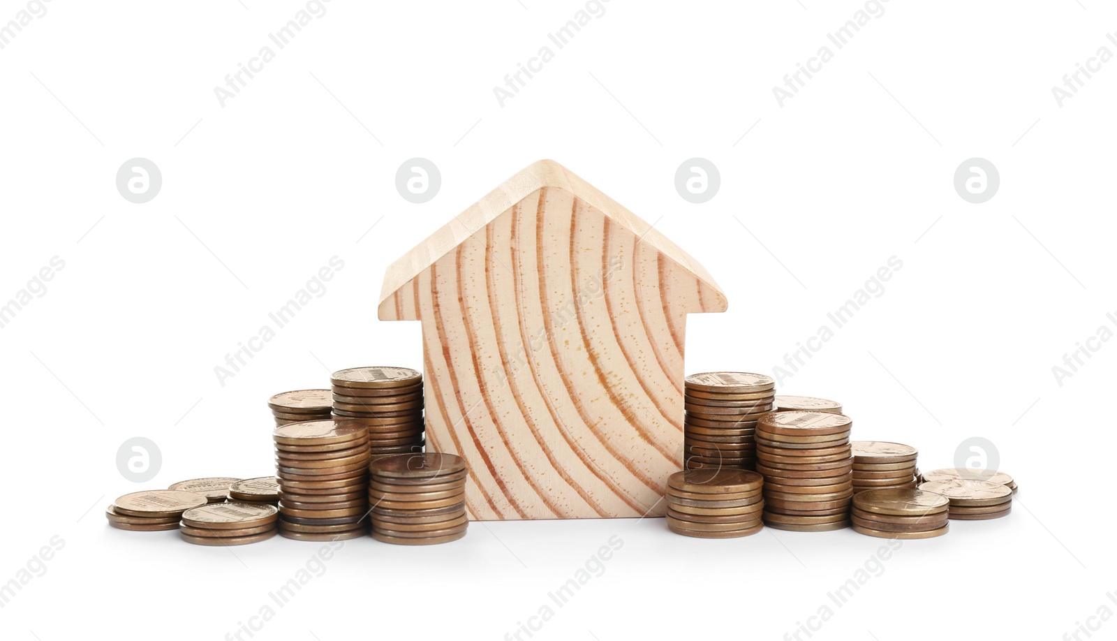 Photo of House model and coins isolated on white