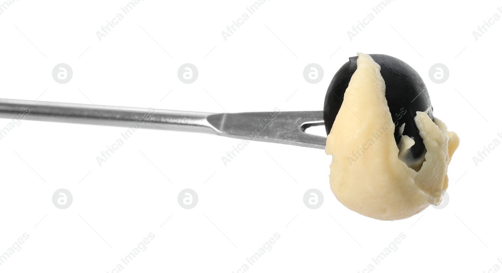 Photo of Tasty fondue. Fork with olive and melted cheese isolated on white