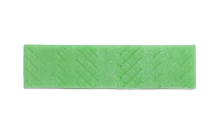 Stick of tasty green bubble gum isolated on white, top view