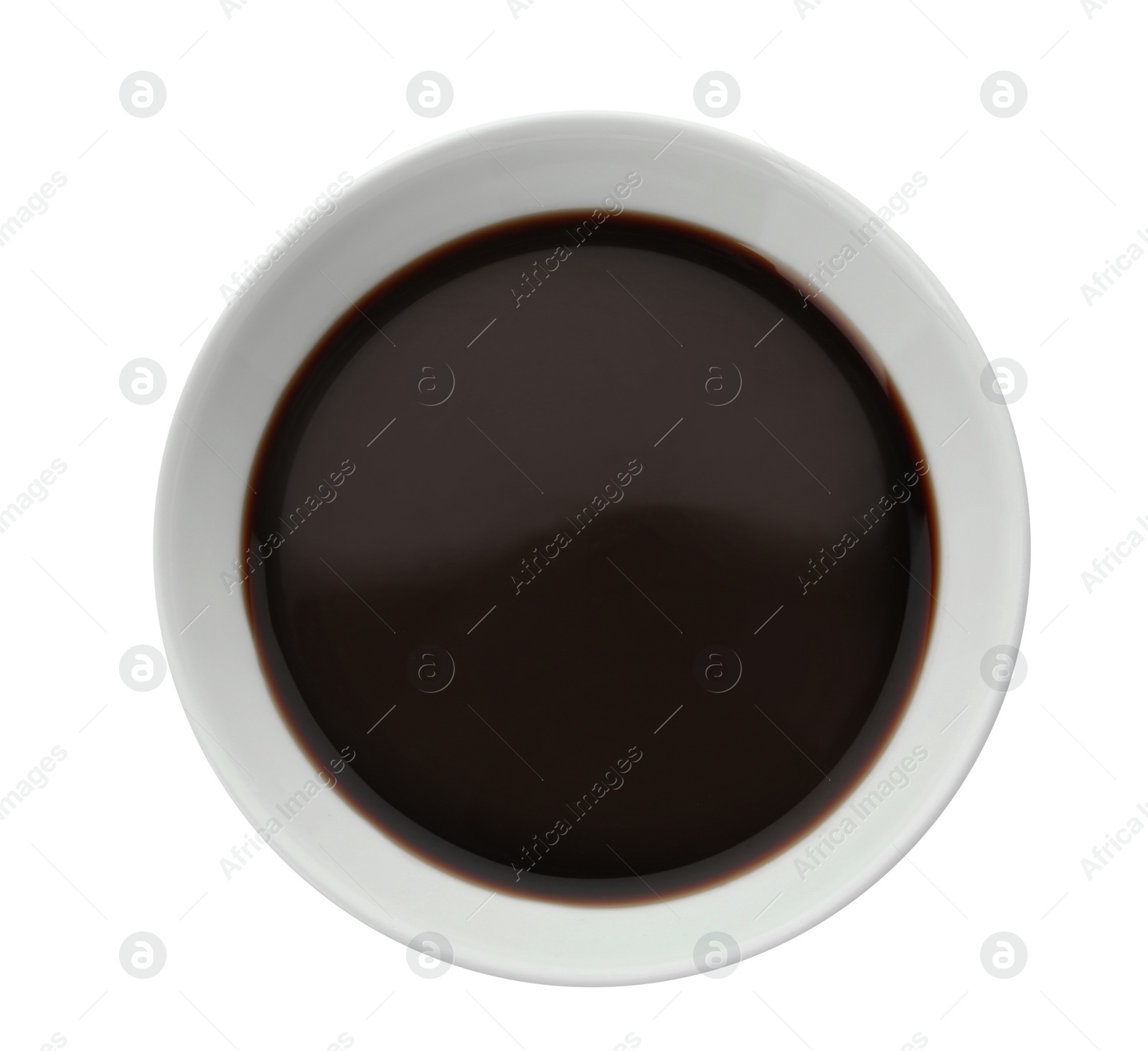 Photo of Bowl of soy sauce on white background, top view