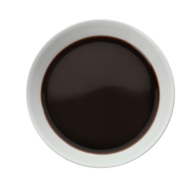 Bowl of soy sauce on white background, top view