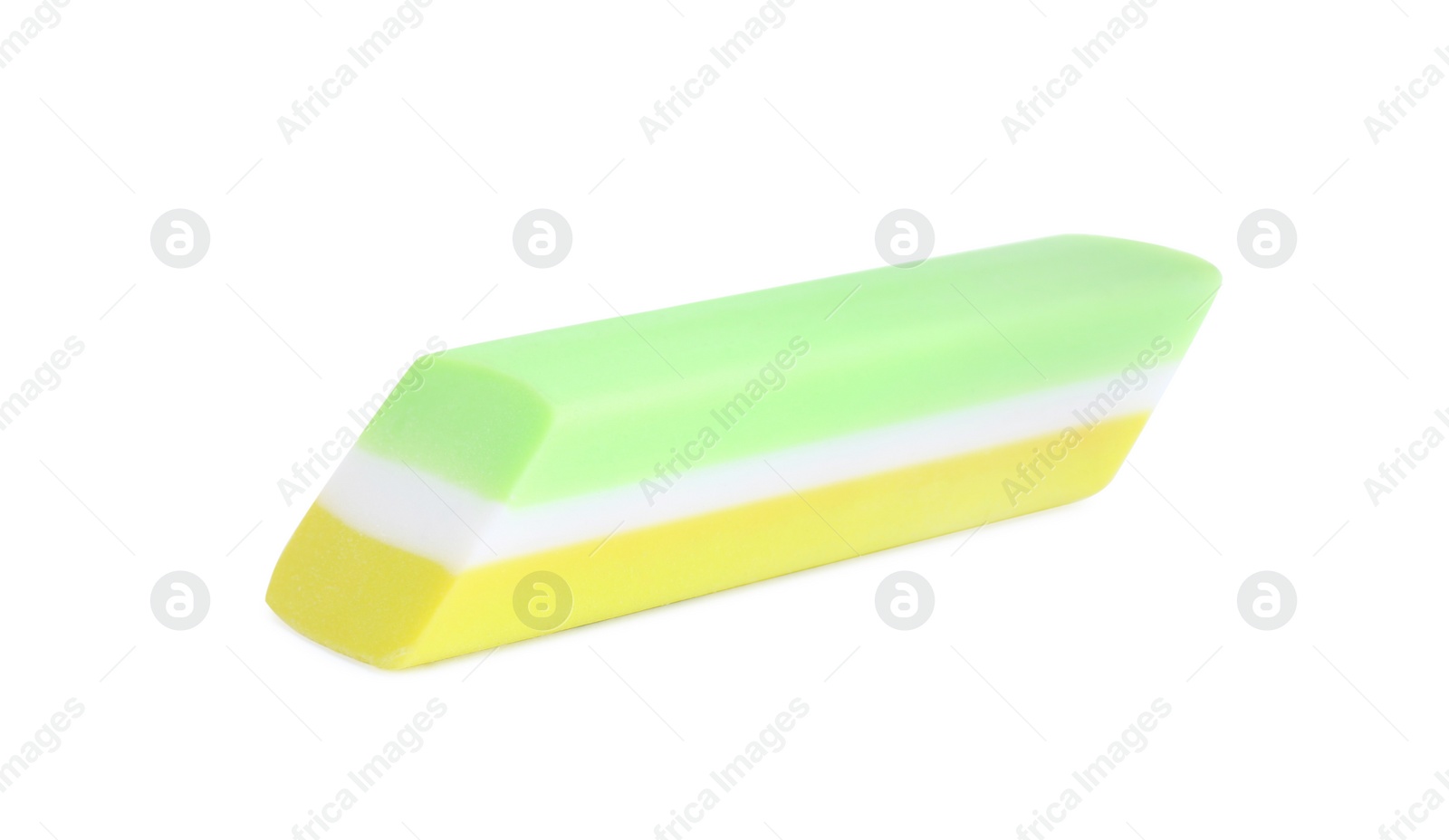 Photo of New eraser isolated on white. School stationery