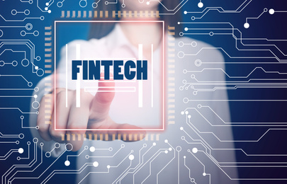 Image of Fintech concept. Woman pointing at icon on virtual screen