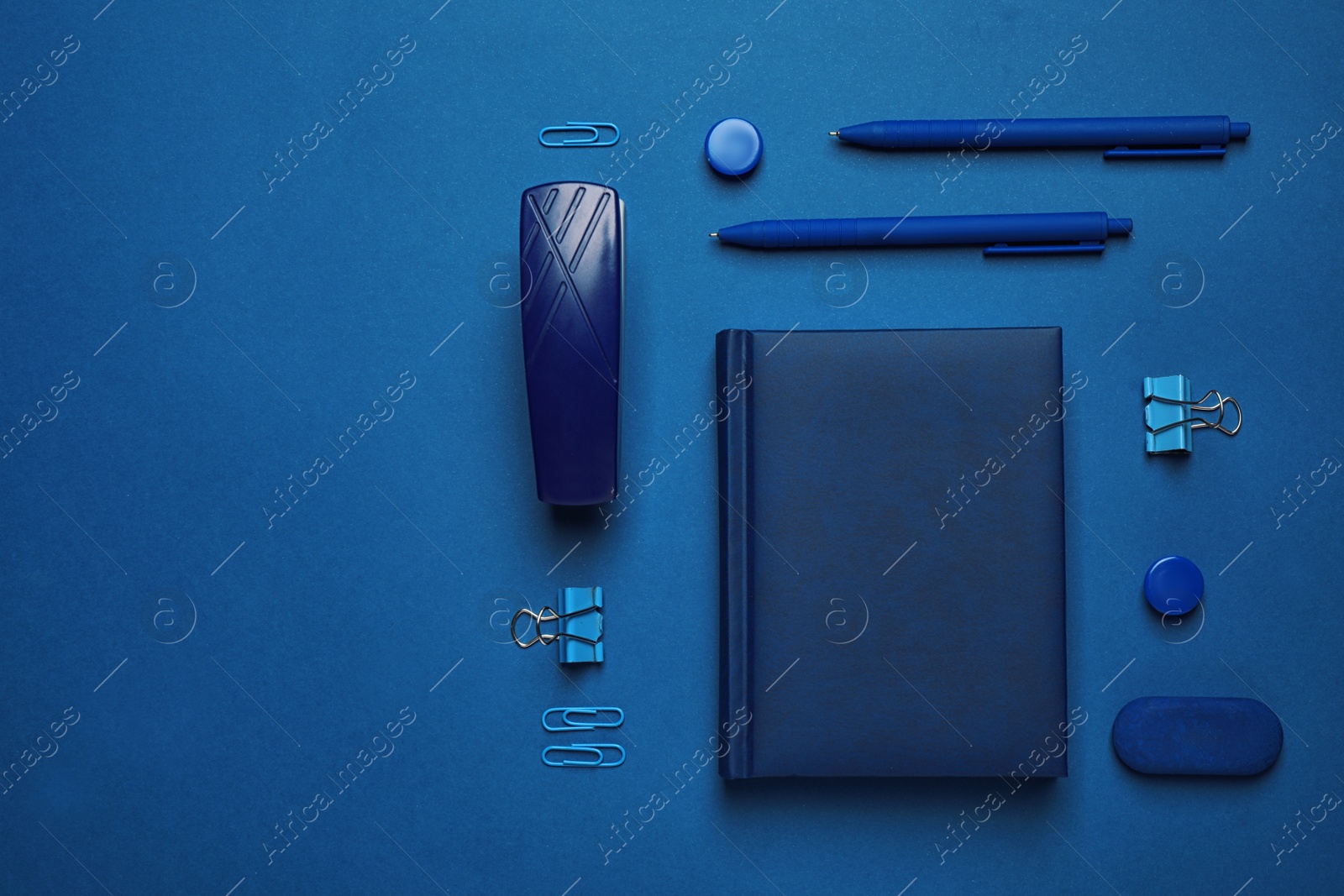 Photo of Flat lay composition inspired by color of the year 2020  (Classic blue)