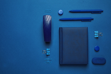 Photo of Flat lay composition inspired by color of the year 2020  (Classic blue)