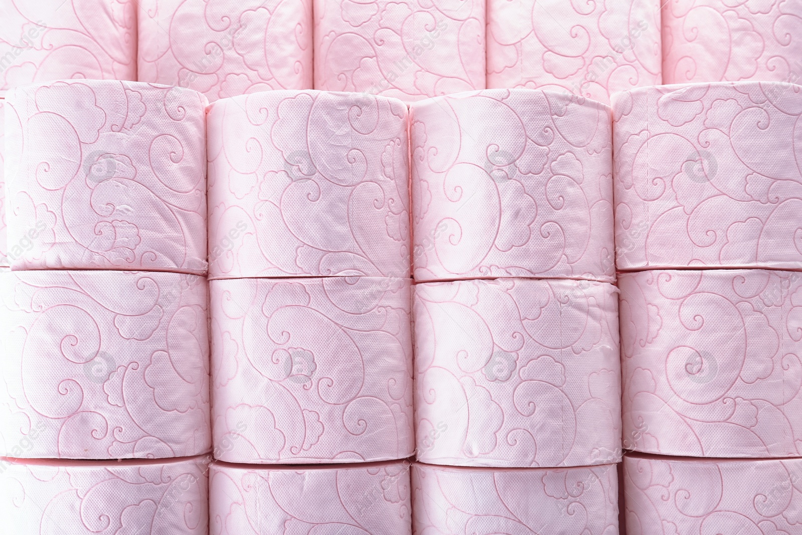 Photo of Many rolls of toilet paper as background. Personal hygiene