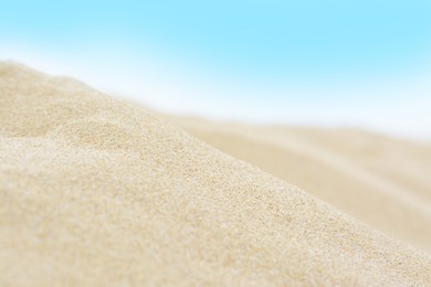 Photo of Beautiful view of sandy beach on summer day, closeup