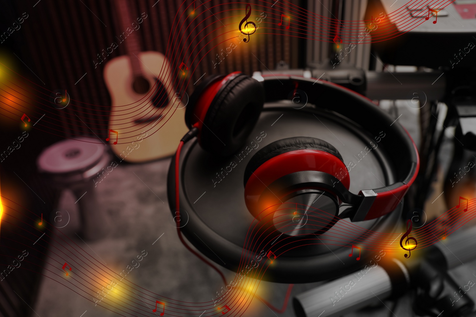 Image of Modern headphones with illustration musical notes at recording studio