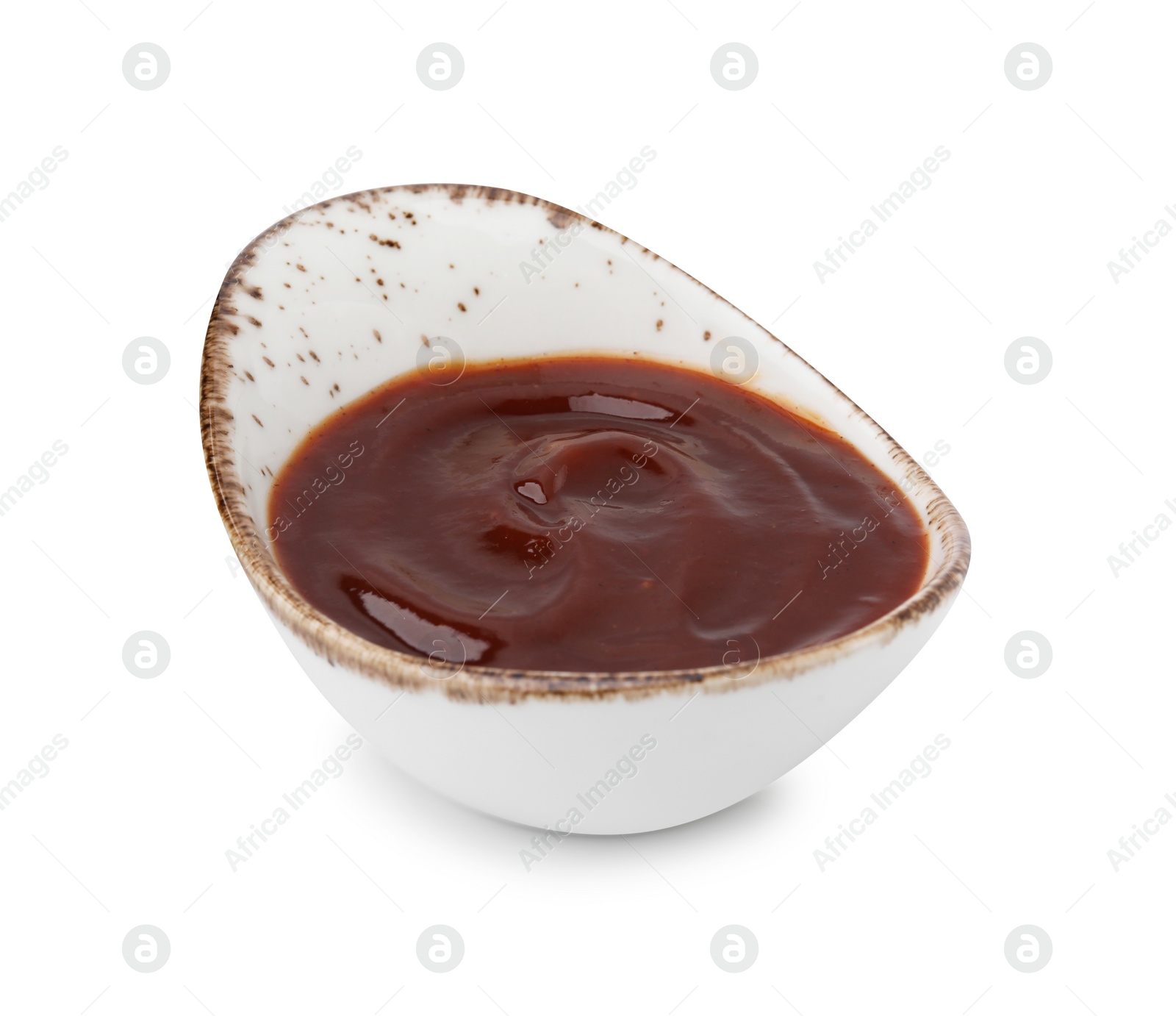 Photo of Marinade in gravy boat isolated on white