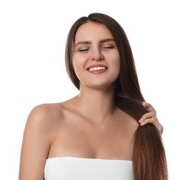 Photo of Young woman with strong healthy hair on white background