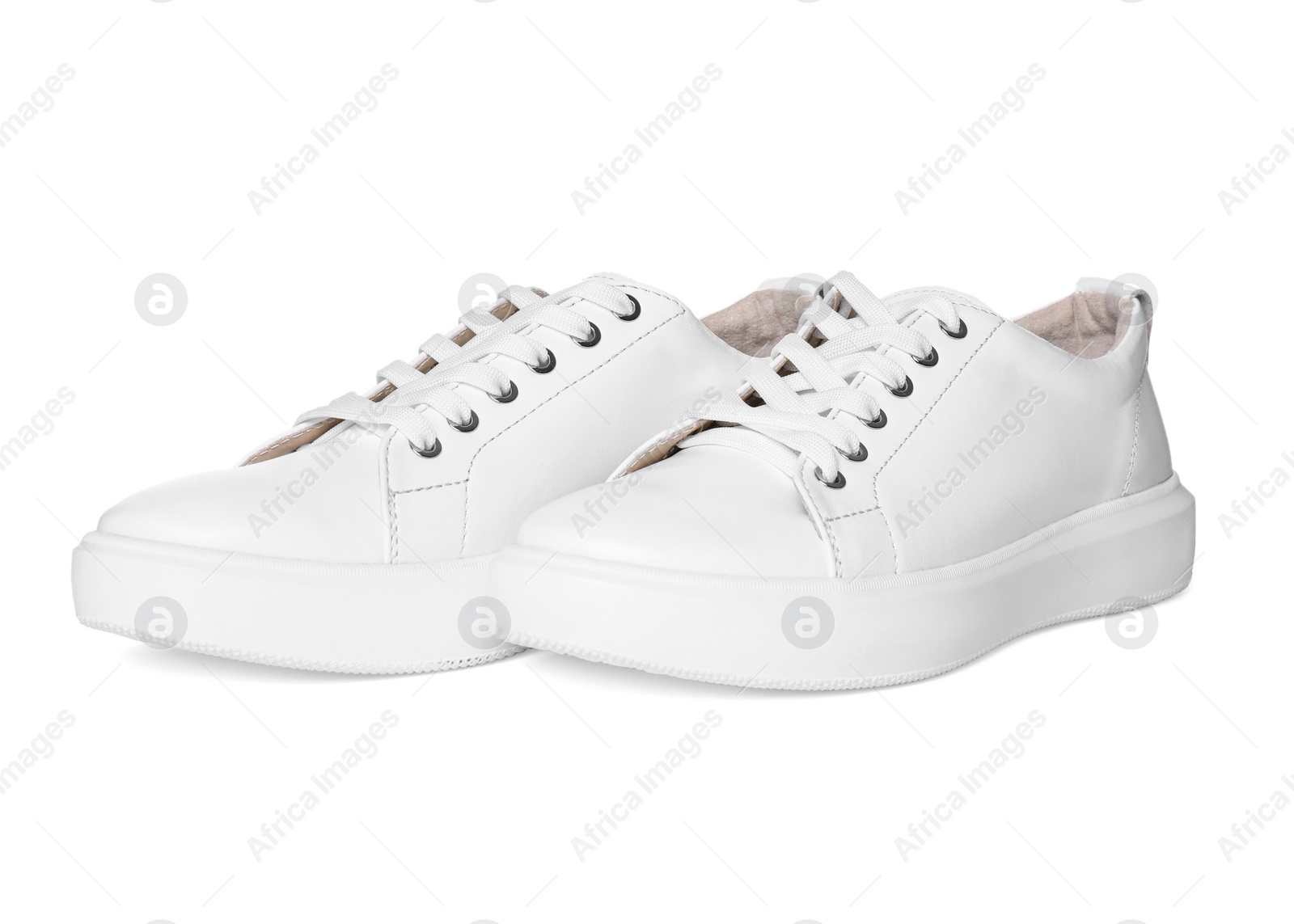 Photo of Pair of stylish sneakers isolated on white