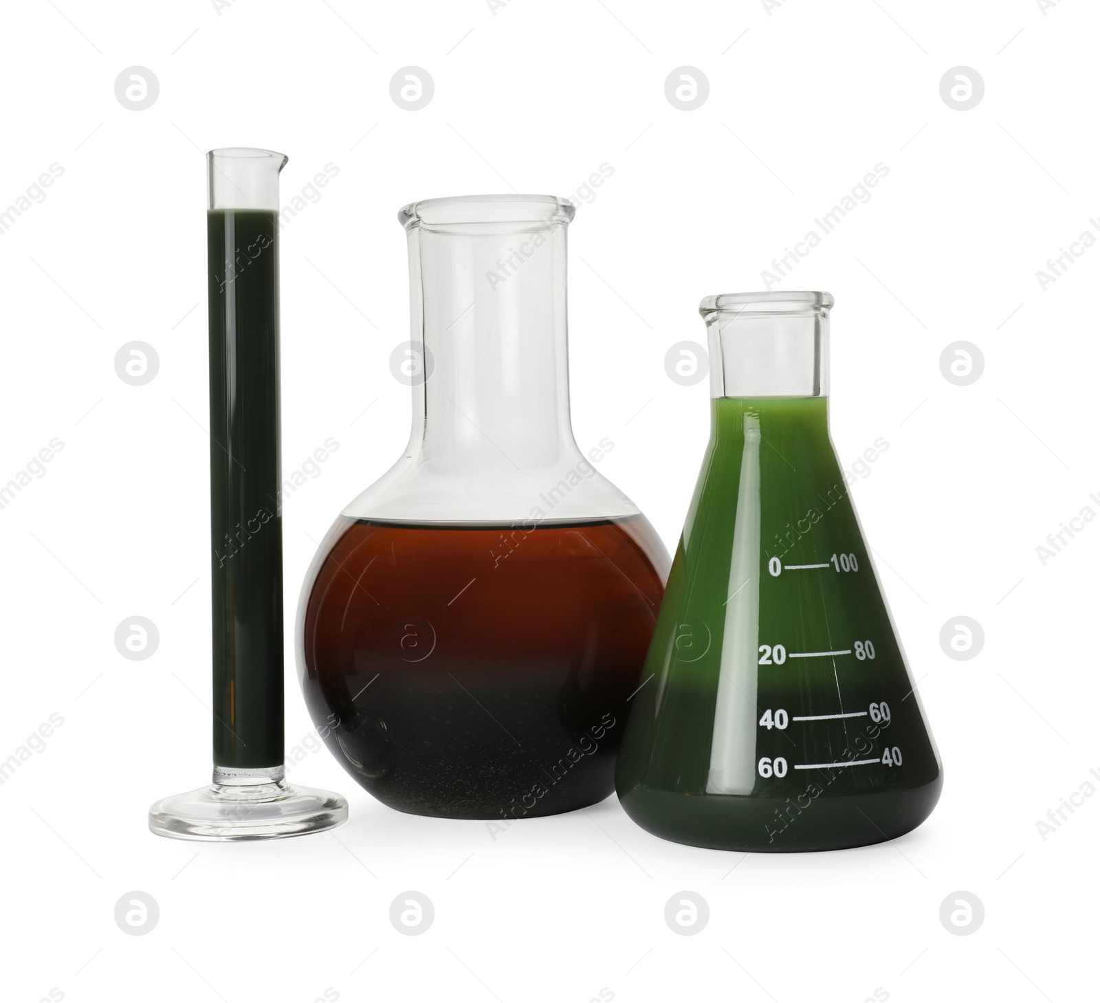 Photo of Laboratory glassware with different types of crude oil isolated on white