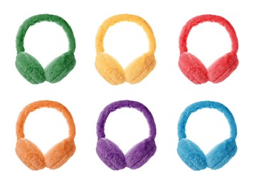 Set with different colorful soft earmuffs on white background 