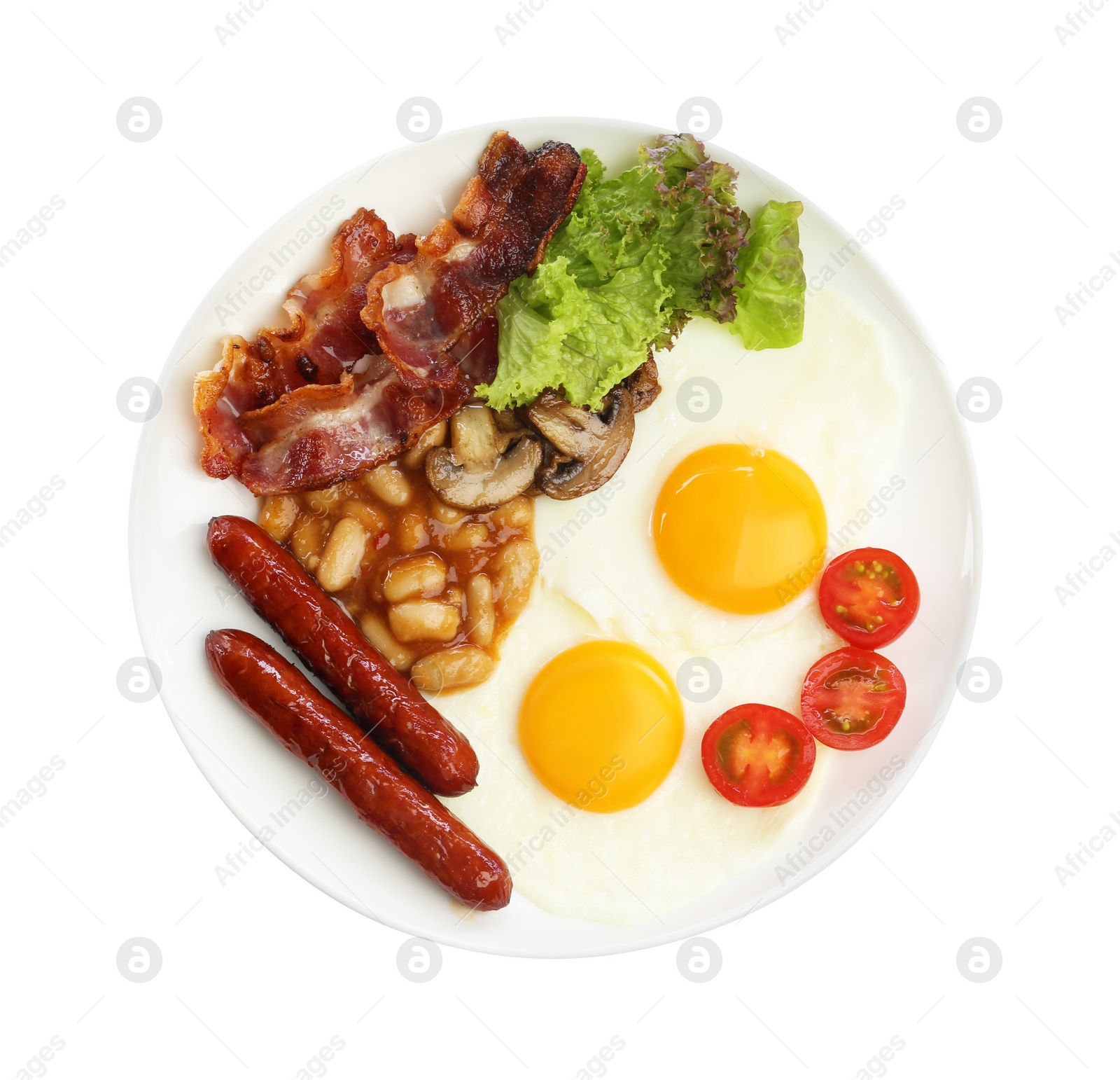 Photo of Delicious breakfast with sunny side up eggs isolated on white, top view