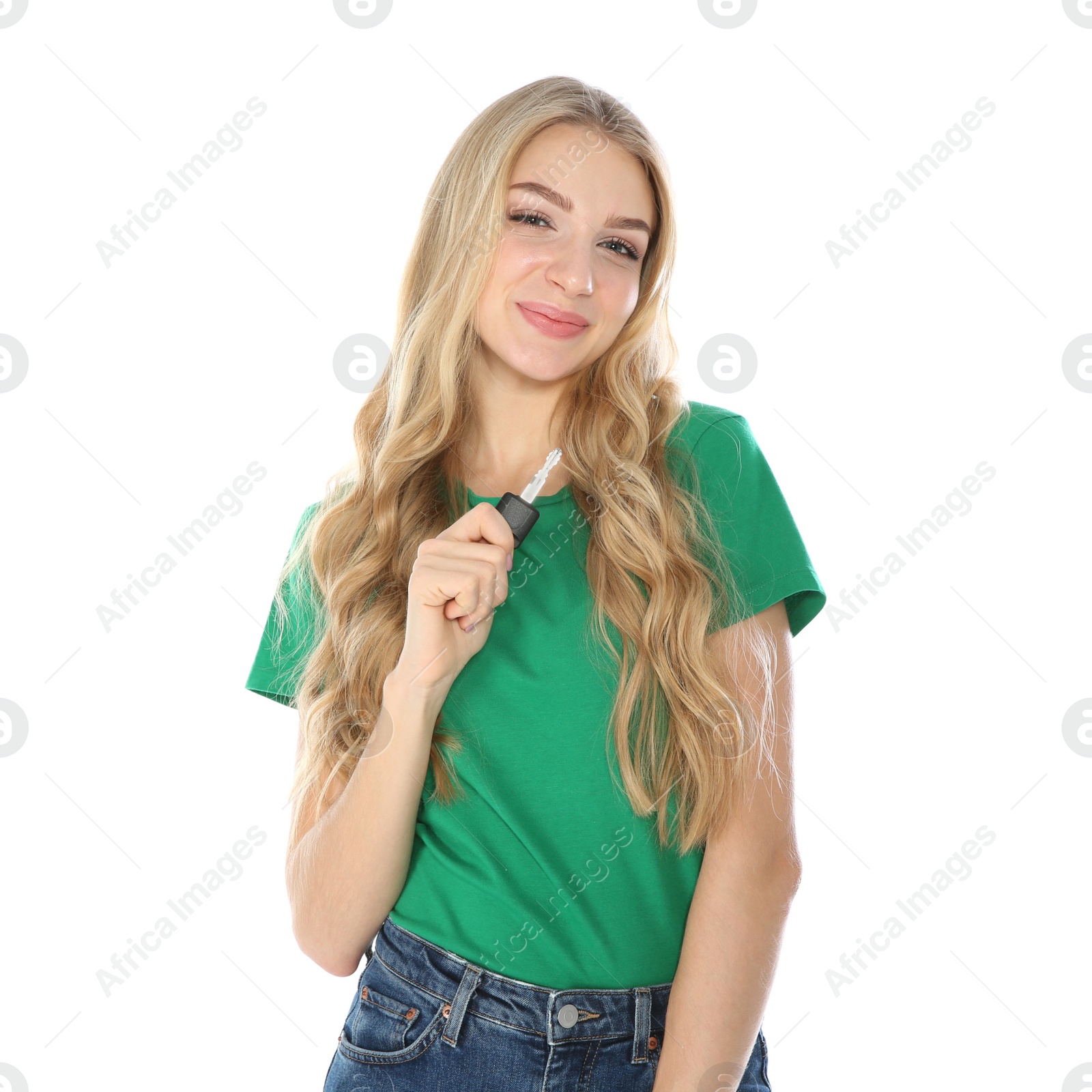 Photo of Happy young woman with car key on white background. Getting driving license