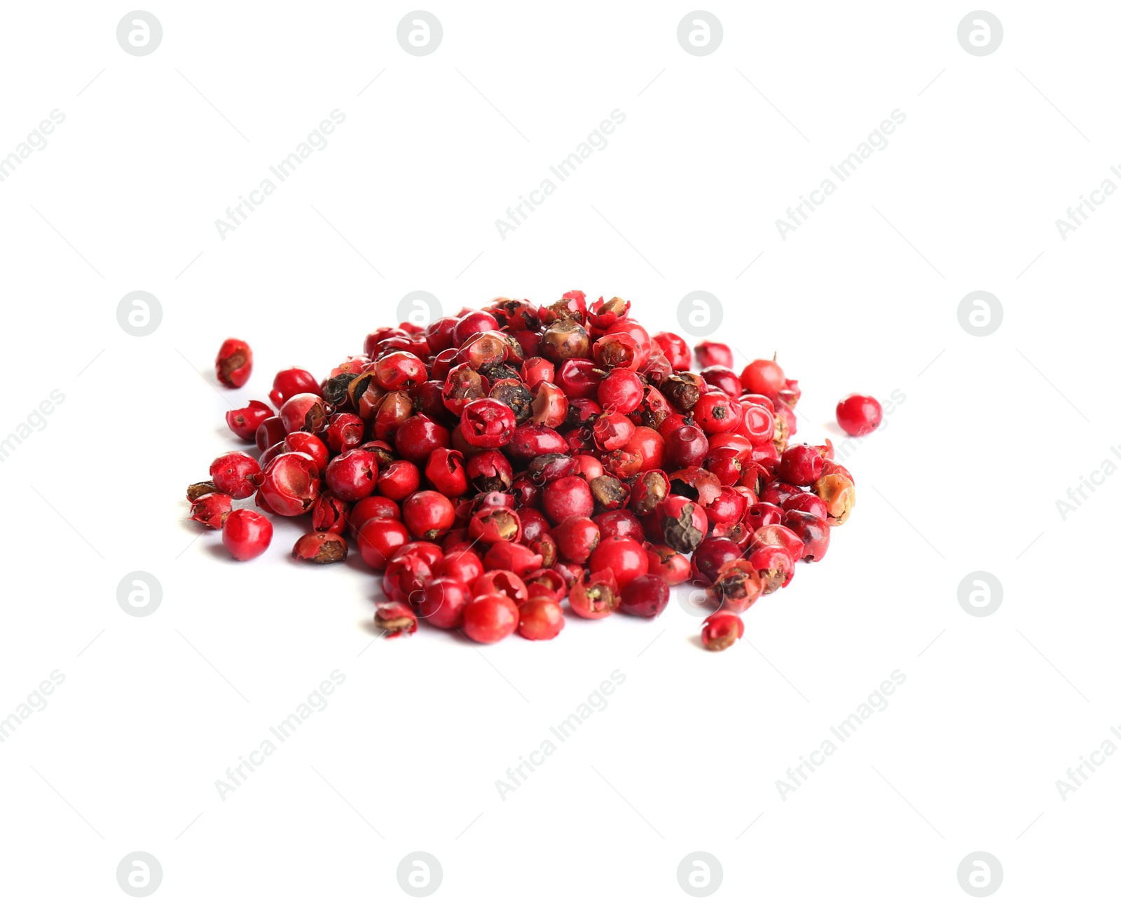 Photo of Heap of red peppercorns isolated on white