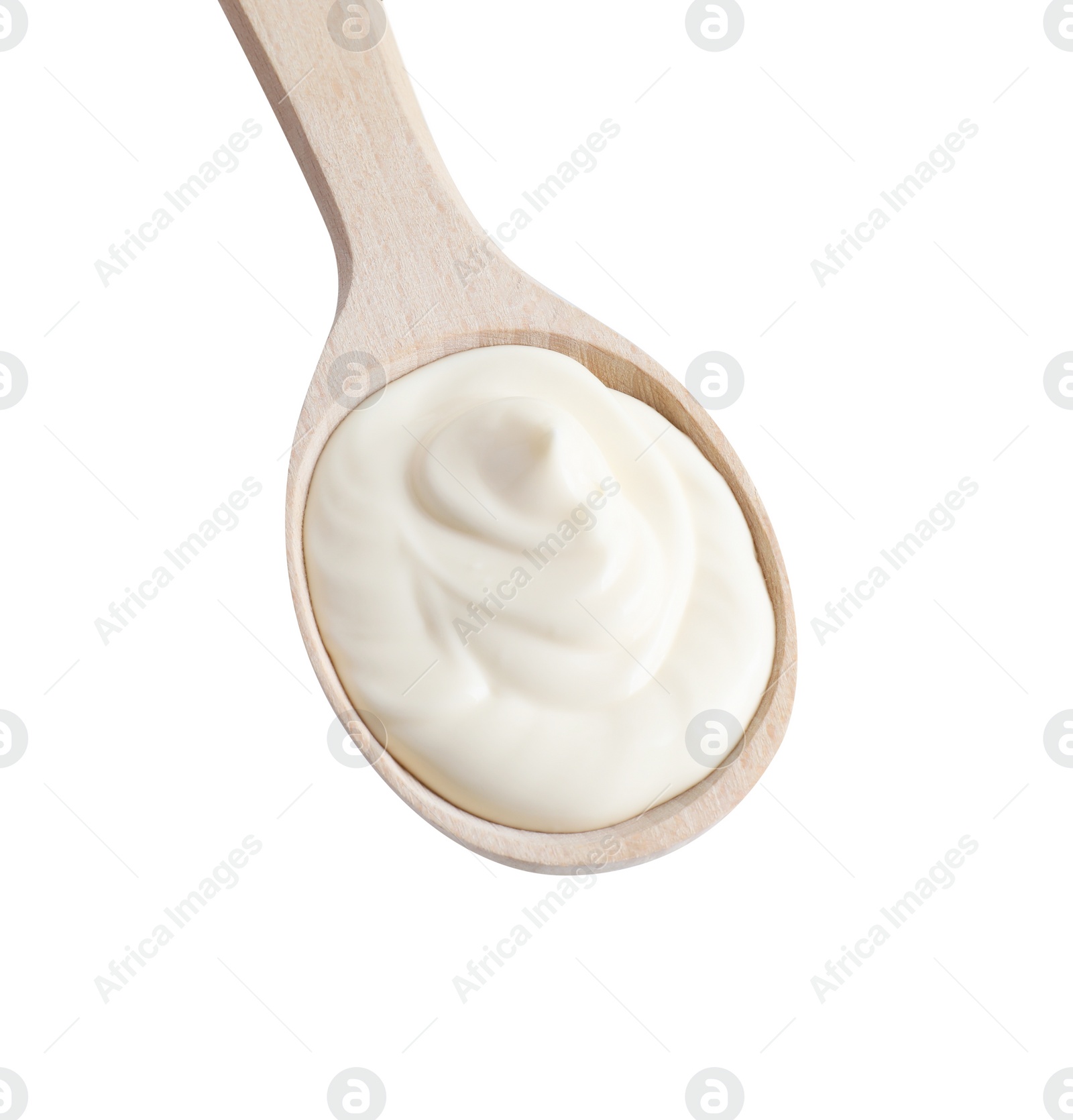 Photo of One wooden spoon with mayonnaise isolated on white