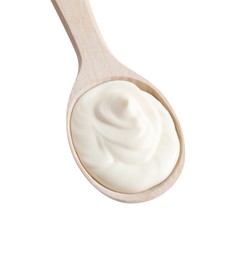 Photo of One wooden spoon with mayonnaise isolated on white