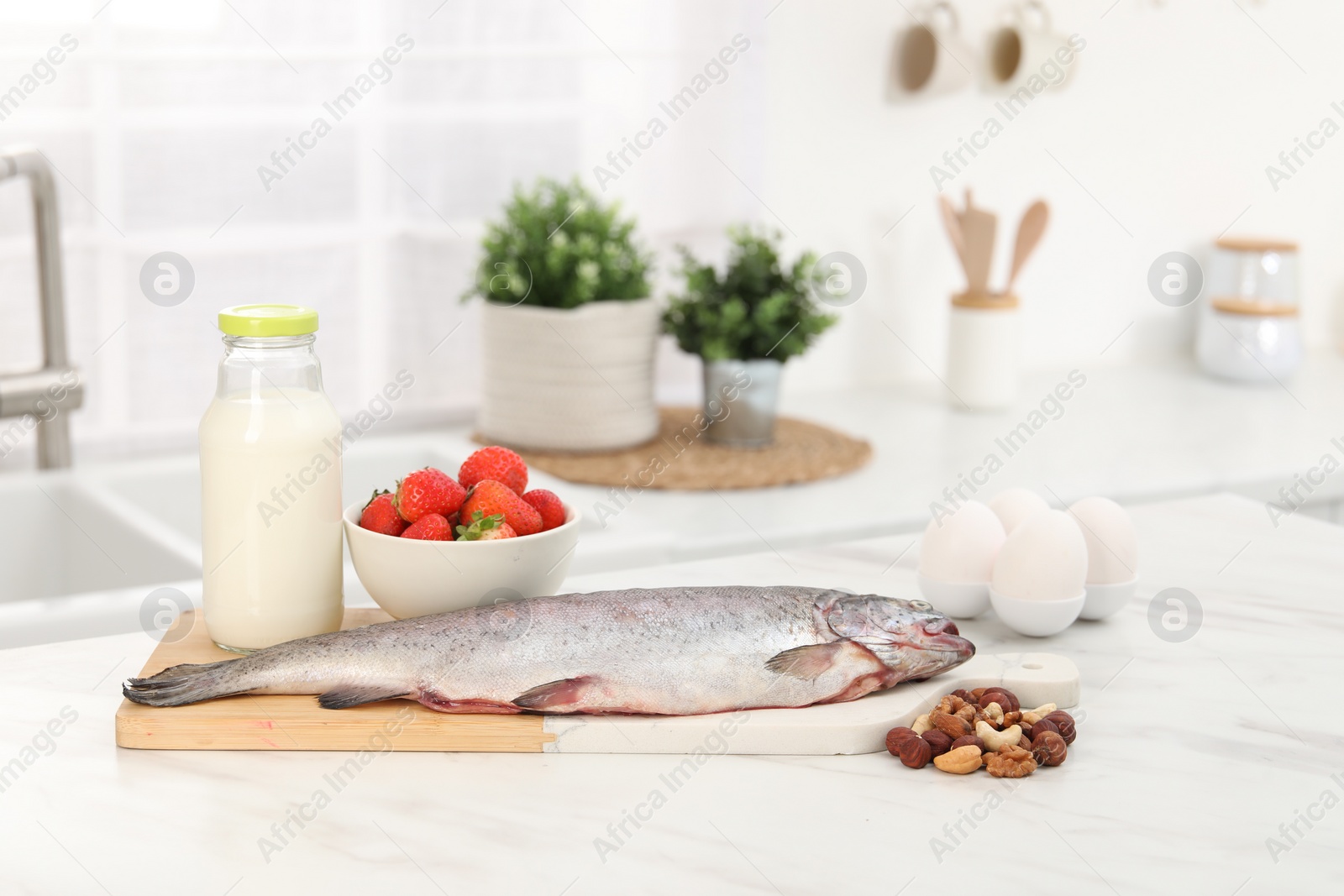 Photo of Allergenic food. Different fresh products on light table in kitchen