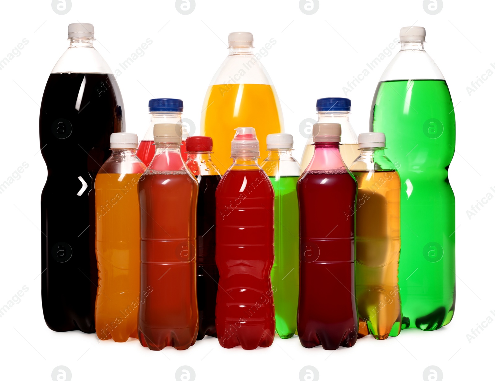 Photo of Bottles of soft drinks on white background