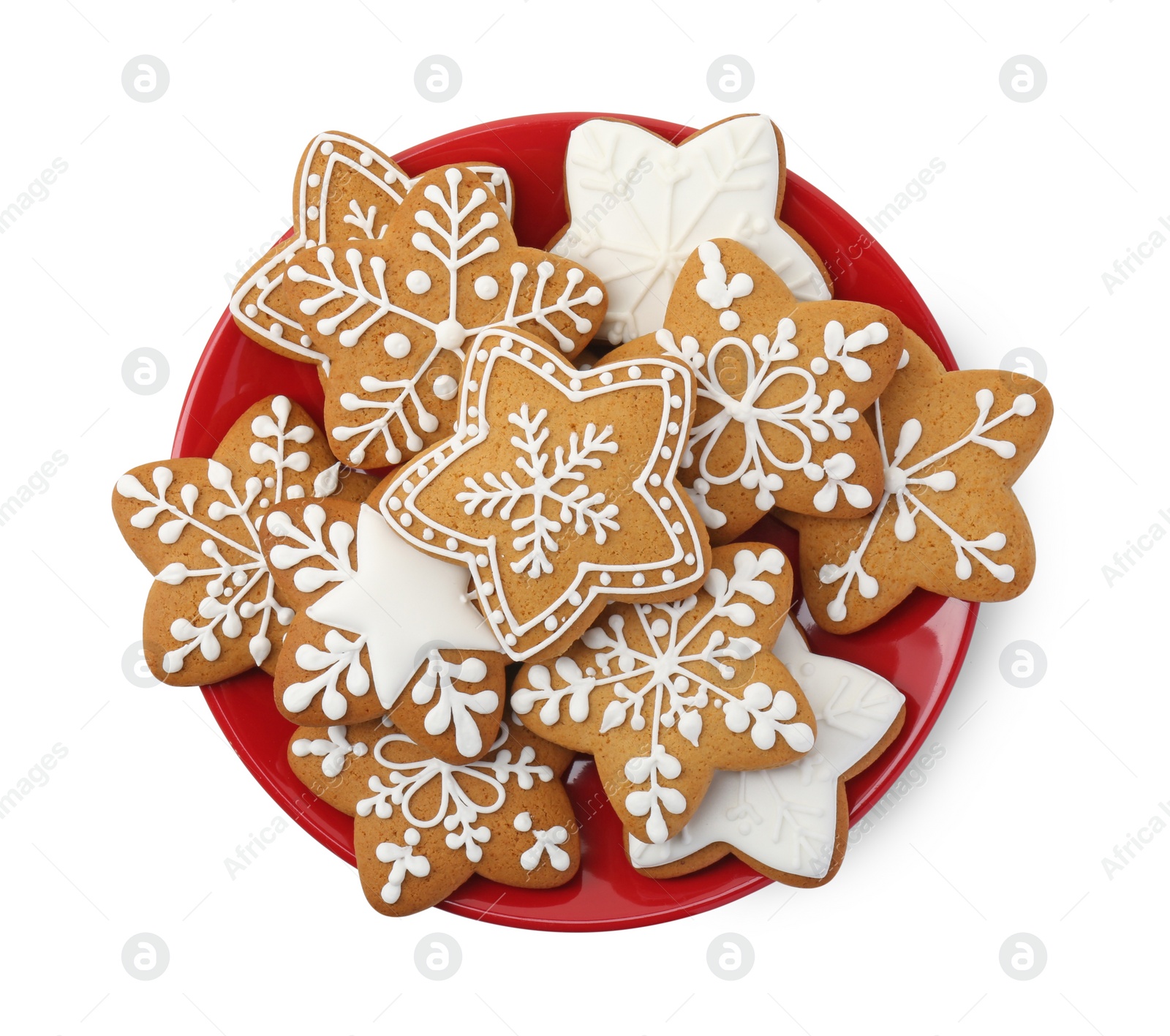 Photo of Tasty star shaped Christmas cookies with icing isolated on white, top view