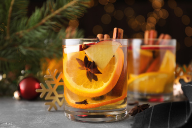 Photo of Aromatic white mulled wine on light grey table