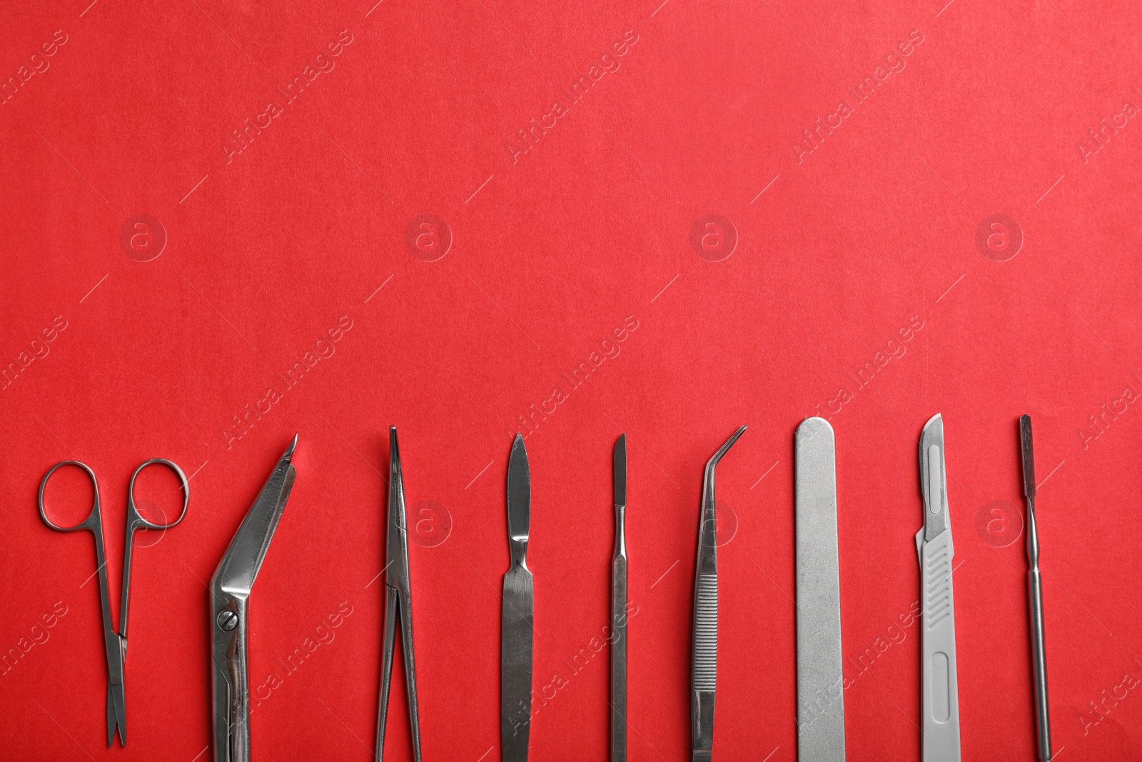 Photo of Flat lay composition with medical instruments and space for text on color background