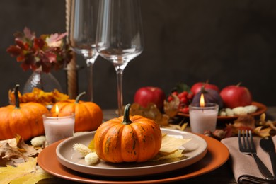 Beautiful autumn place setting and decor on table