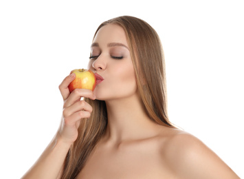 Photo of Young woman with apple on white background. Vitamin rich food