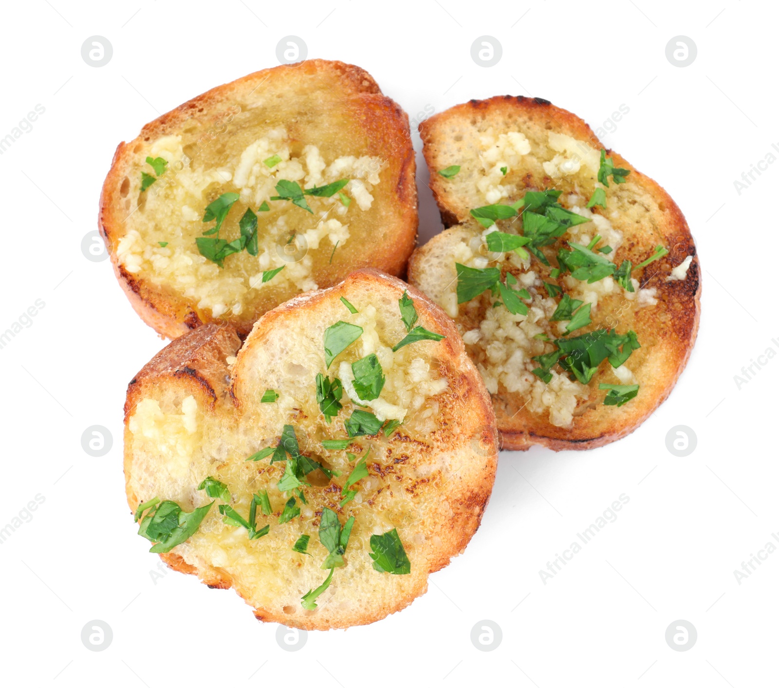 Photo of Slices of toasted bread with garlic and herb on white background, top view