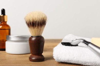 Photo of Set of men's shaving tools on wooden table