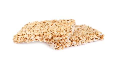 Photo of Delicious rice crispy treats on white background