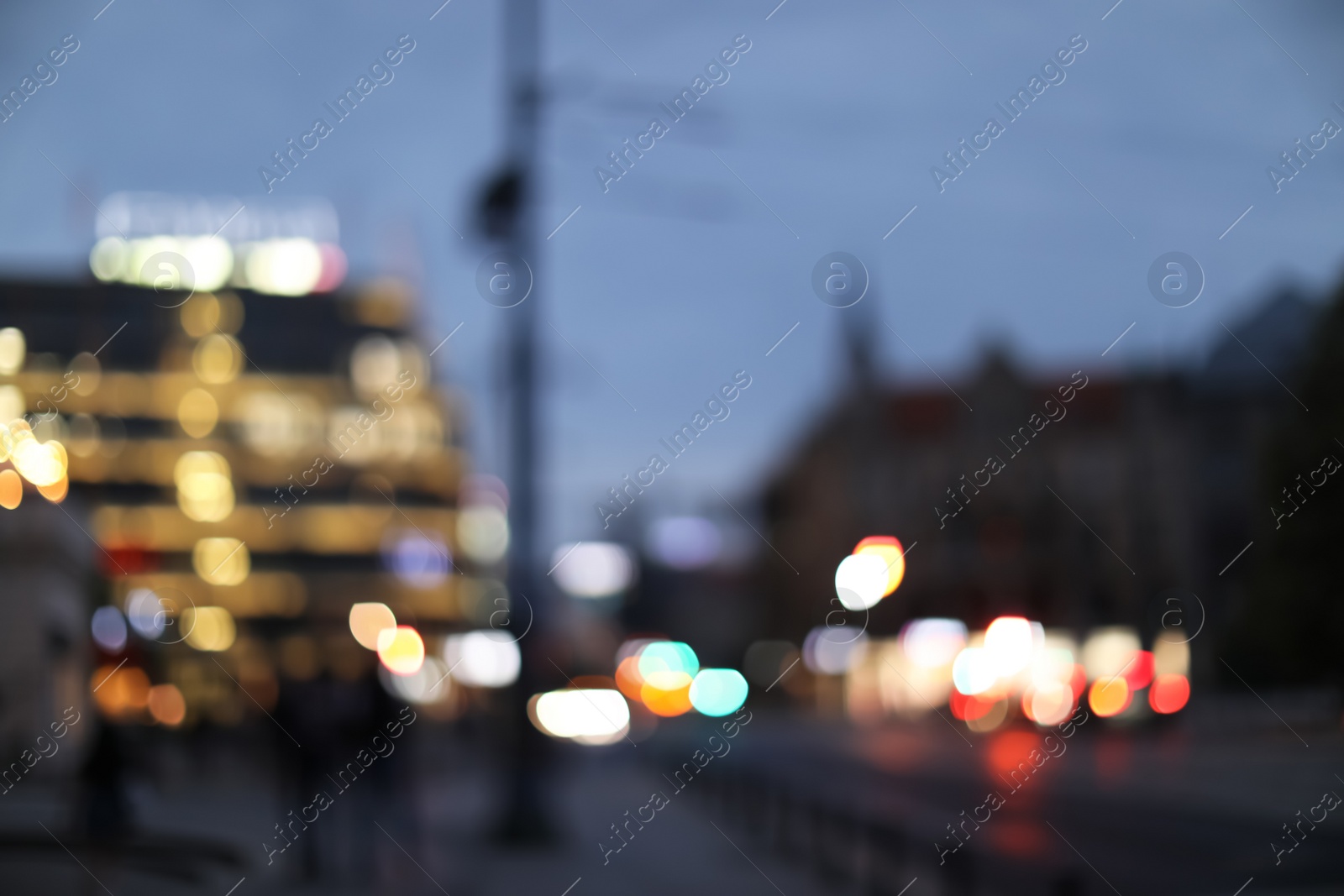 Photo of Blurred view of beautiful city in evening