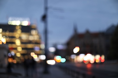 Photo of Blurred view of beautiful city in evening