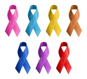 Image of Set with different color ribbons on white background. World Cancer Day