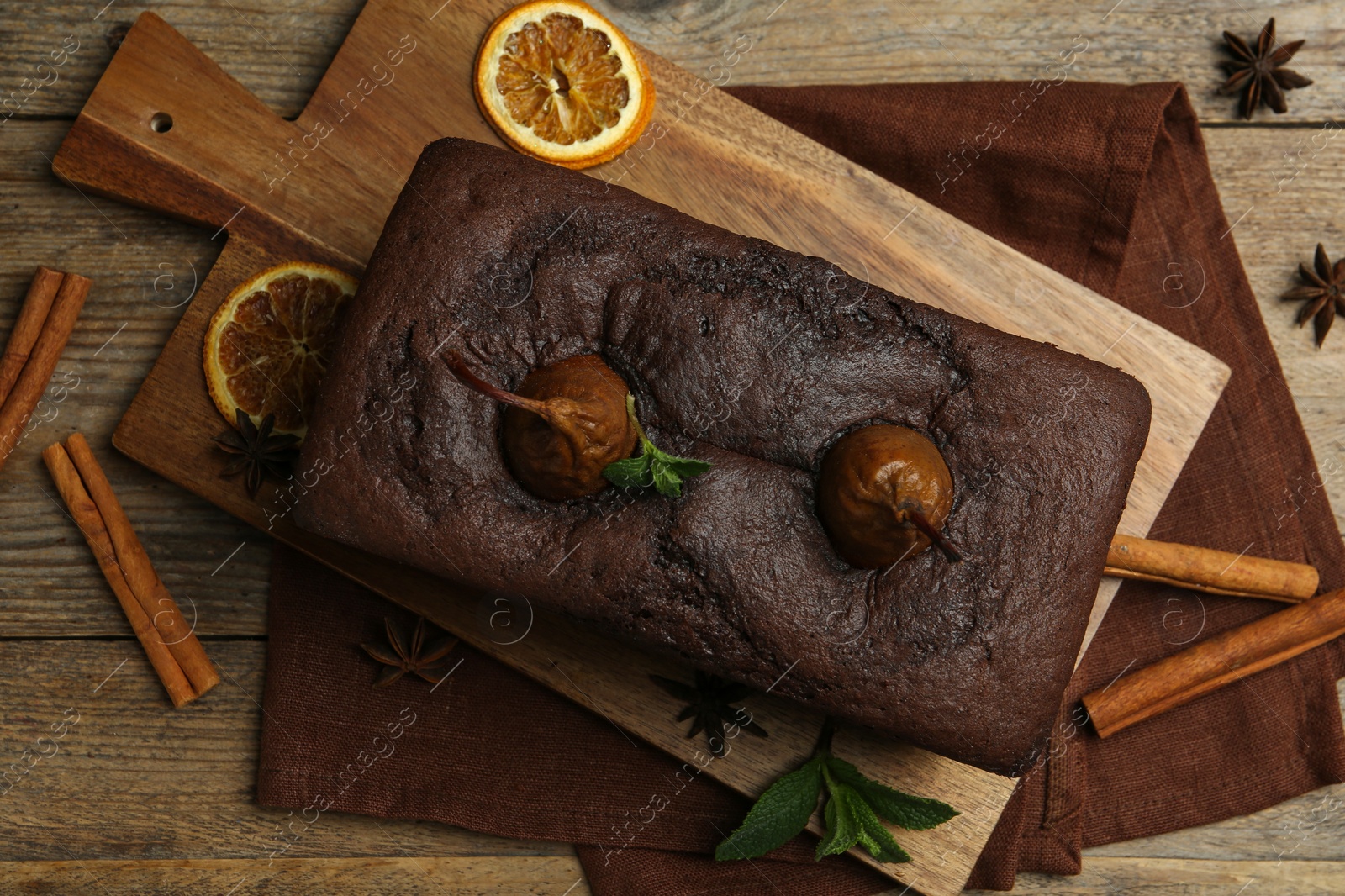 Photo of Flat lay composition with tasty pear bread on wooden table. Homemade cake