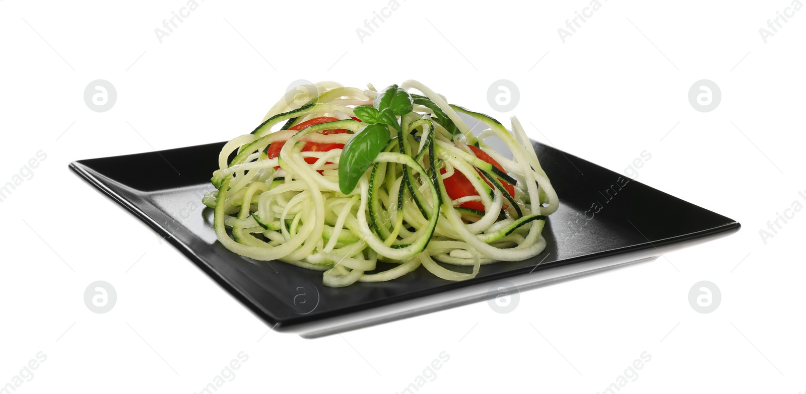 Photo of Tasty zucchini pasta with tomatoes and basil isolated on white