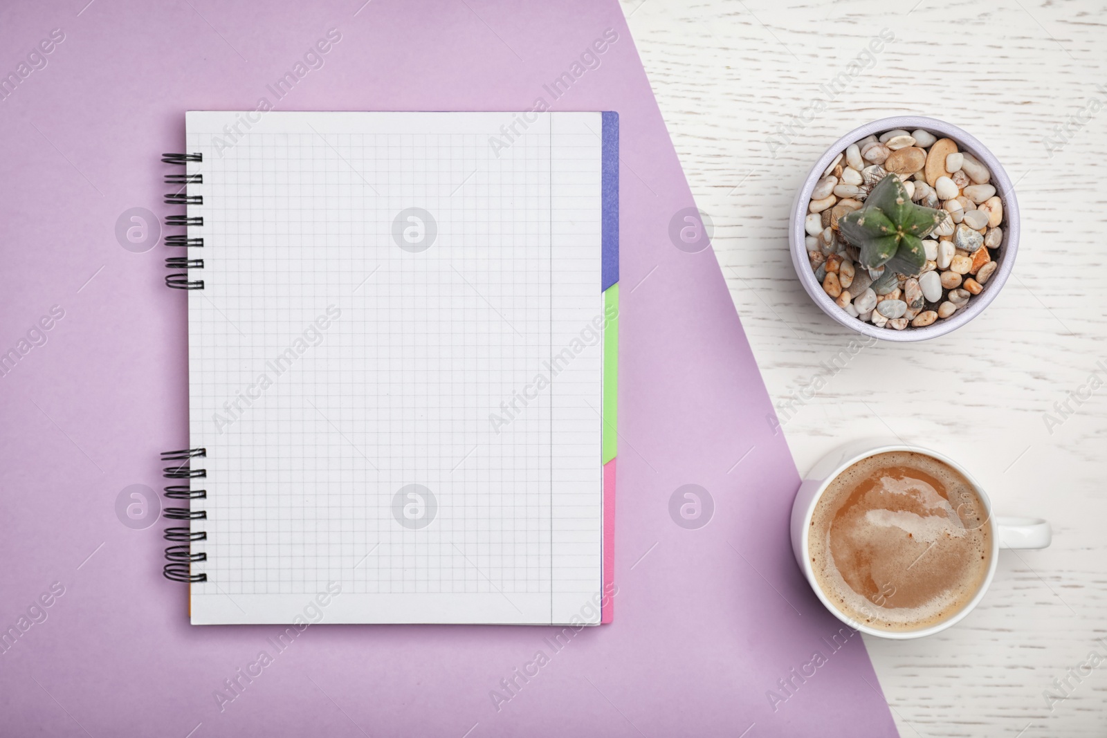 Photo of Flat lay composition with notebook and cup of aromatic coffee on color background