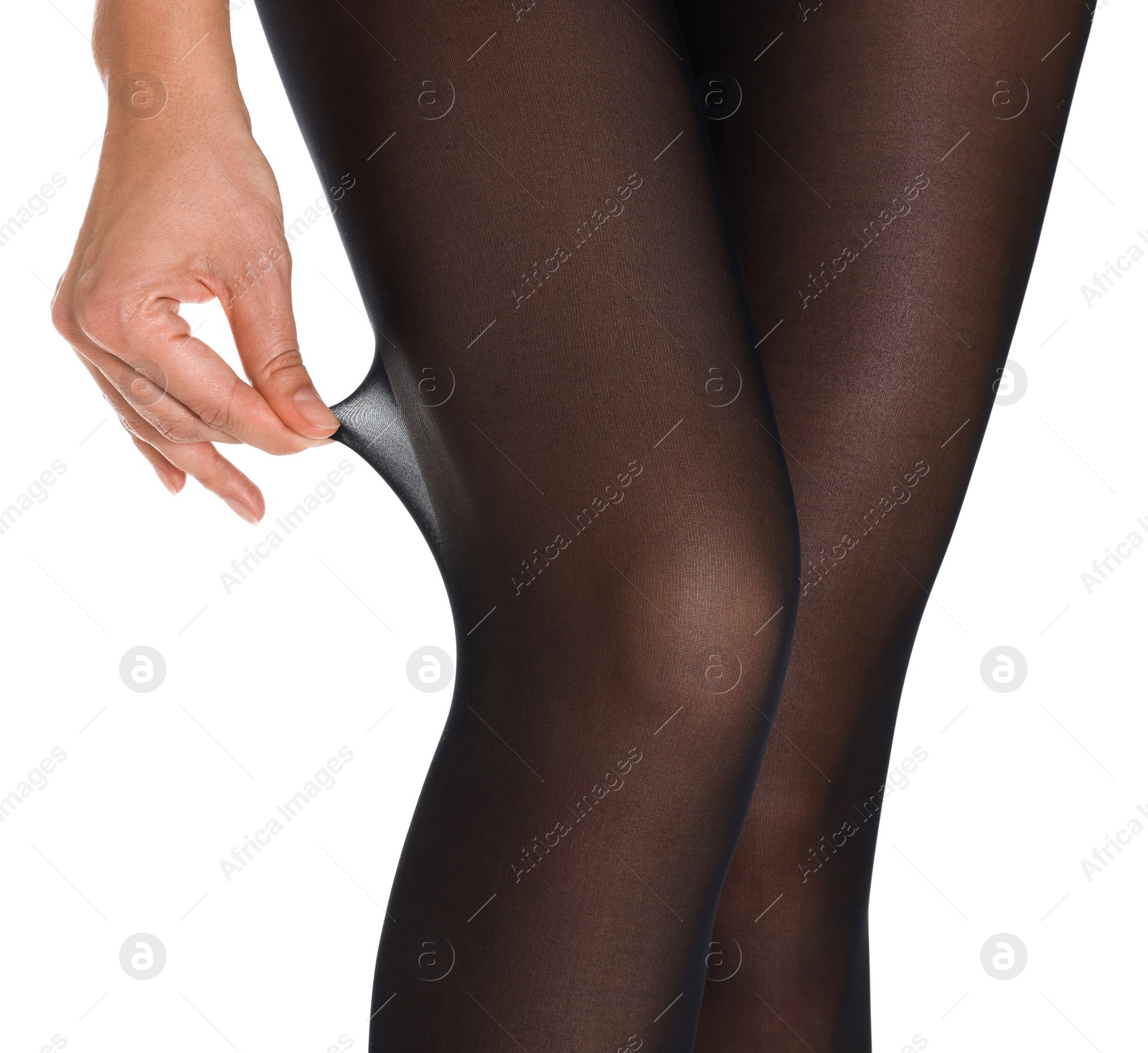 Photo of Woman with beautiful long legs wearing black tights on white background, closeup