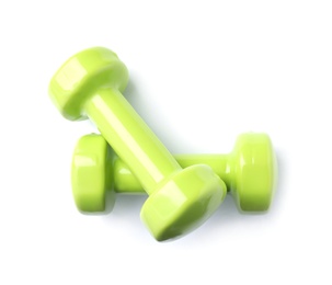 Photo of Color dumbbells on white background. Home fitness