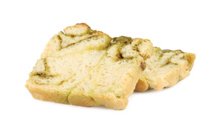 Slices of freshly baked pesto bread isolated on white