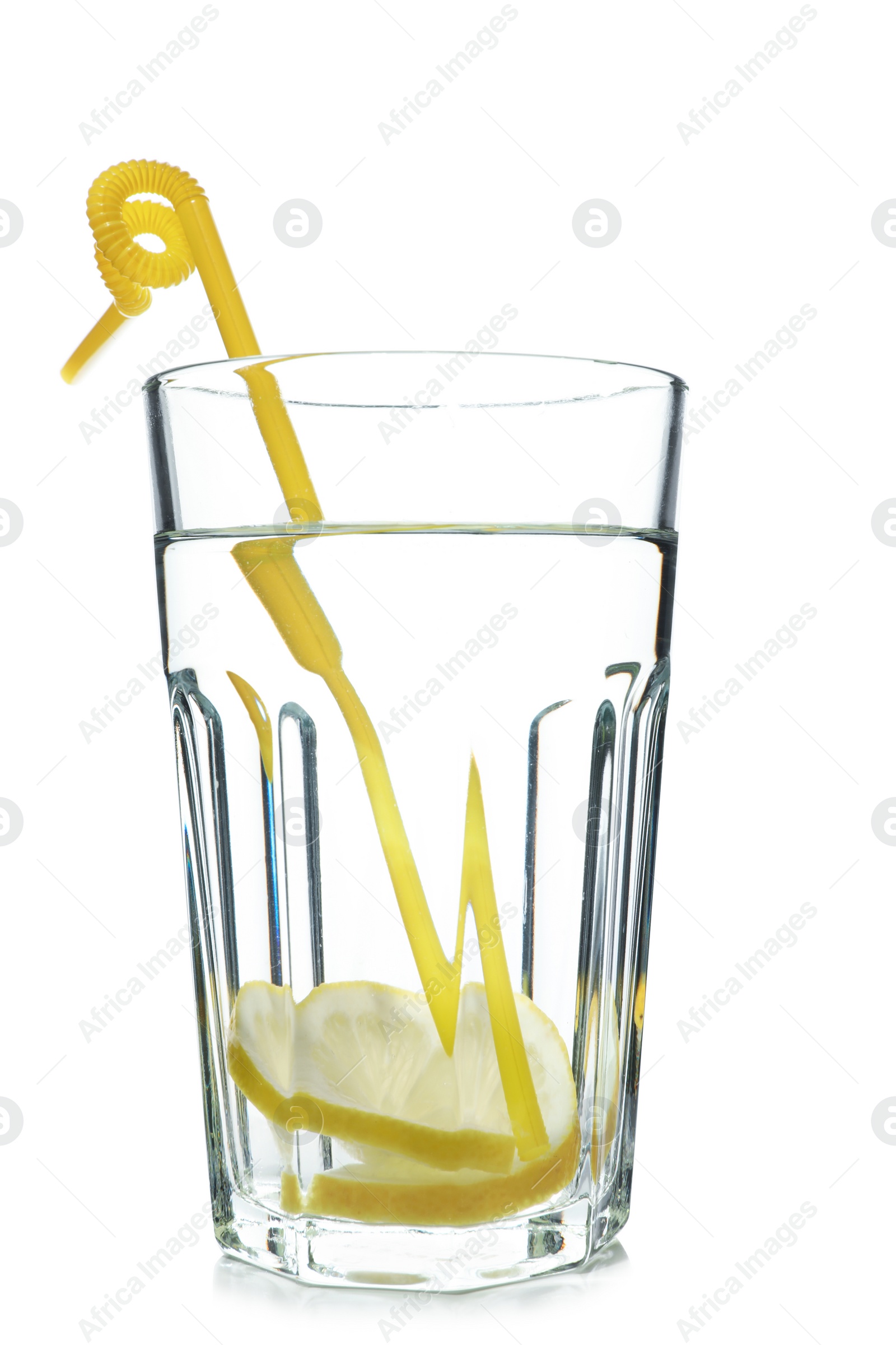 Photo of Glass of water with lemon and straw on white background. Refreshing drink