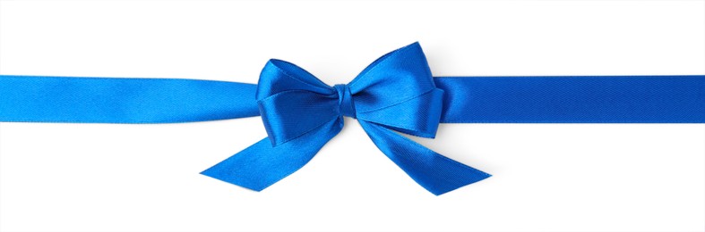 Photo of Blue satin ribbon with bow on white background, top view