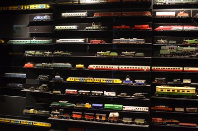 Photo of Utrecht, Netherlands - July 23, 2022: Models of different old trains on display in Spoorwegmuseum