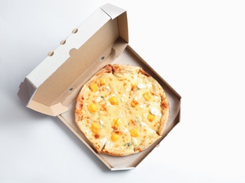 Photo of Carton box with hot cheese pizza Margherita on white background, top view