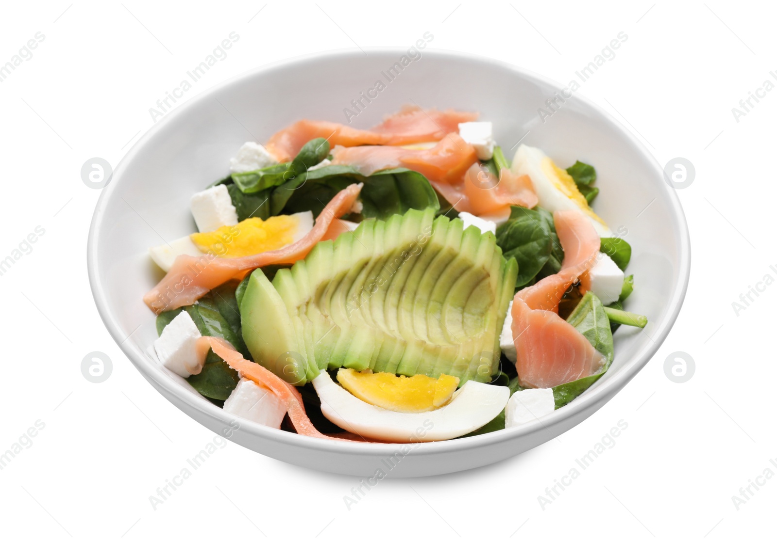Photo of Delicious salad with boiled egg, salmon and avocado in bowl isolated on white