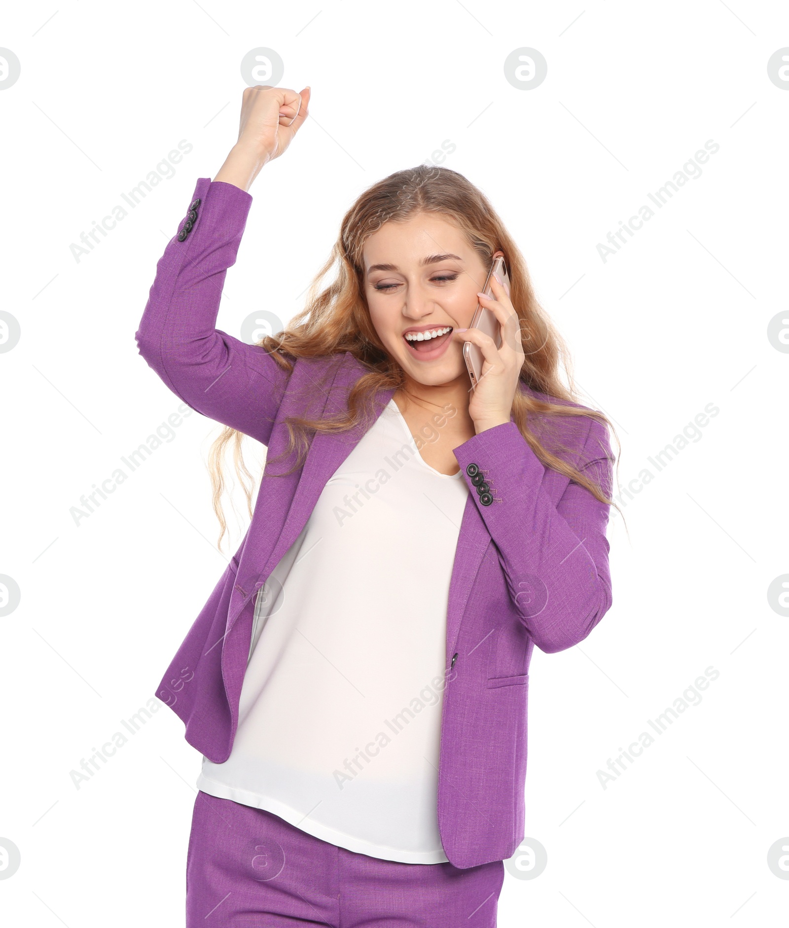 Photo of Happy young businesswoman with smartphone celebrating victory on white background