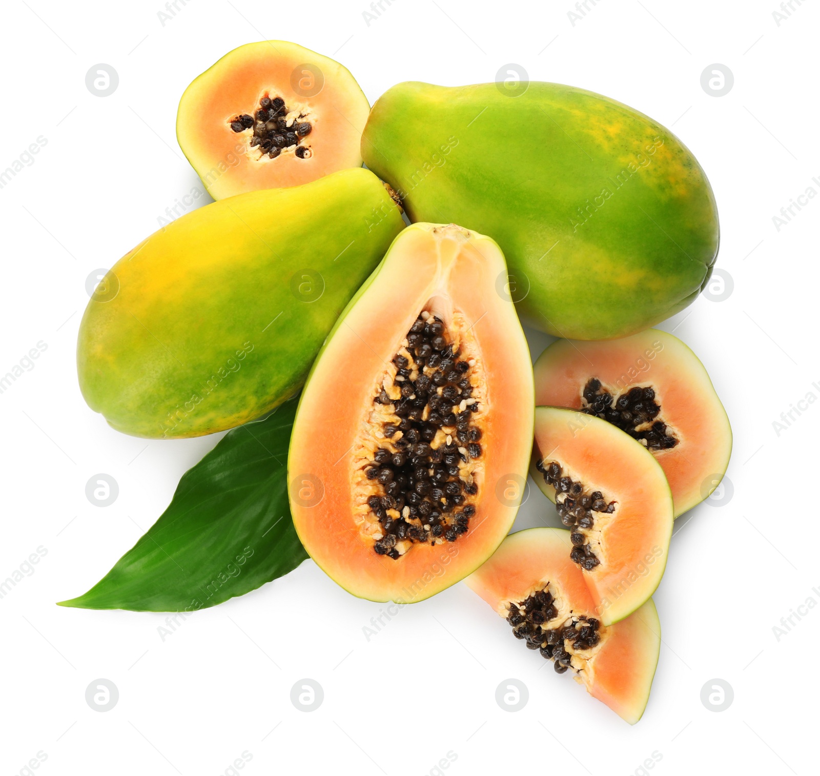 Photo of Fresh ripe papaya fruits with green leaf on white background, top view
