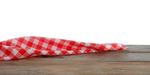 Photo of Red checkered cloth on wooden table against white background. Mockup for design